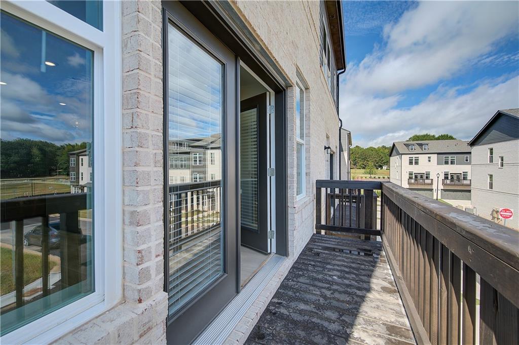 313 Daybreak Lane Newnan, GA 30265 - Photo 14 of 26 a balcony view with a balcony