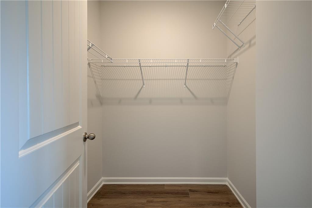 313 Daybreak Lane Newnan, GA 30265 - Photo 22 of 26 a view of a room with racks on the wall