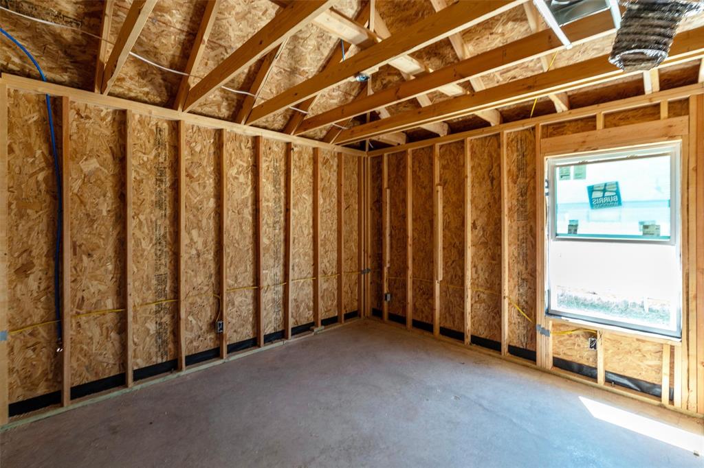 1300 Promised Land Road Hewitt, TX 76643 - Photo 11 of 21 Framed interior space with exposed ceiling trusses and a single window