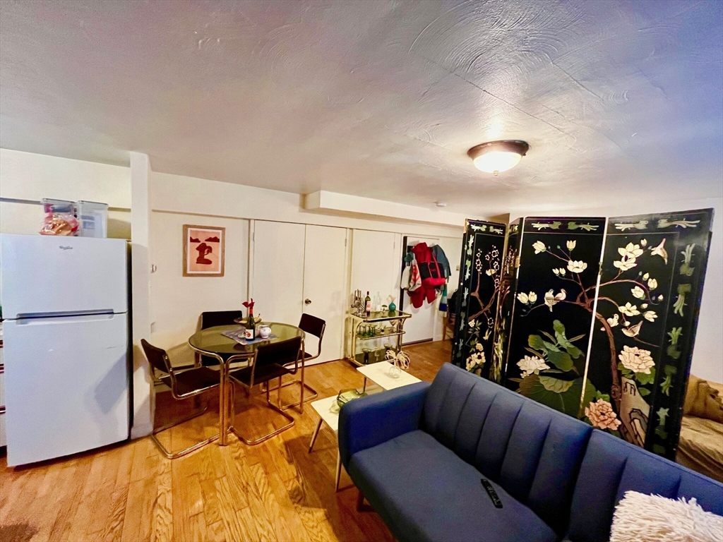 a living room with furniture a store and a table
