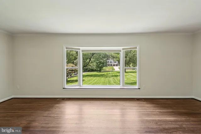 a view of a room that has a window