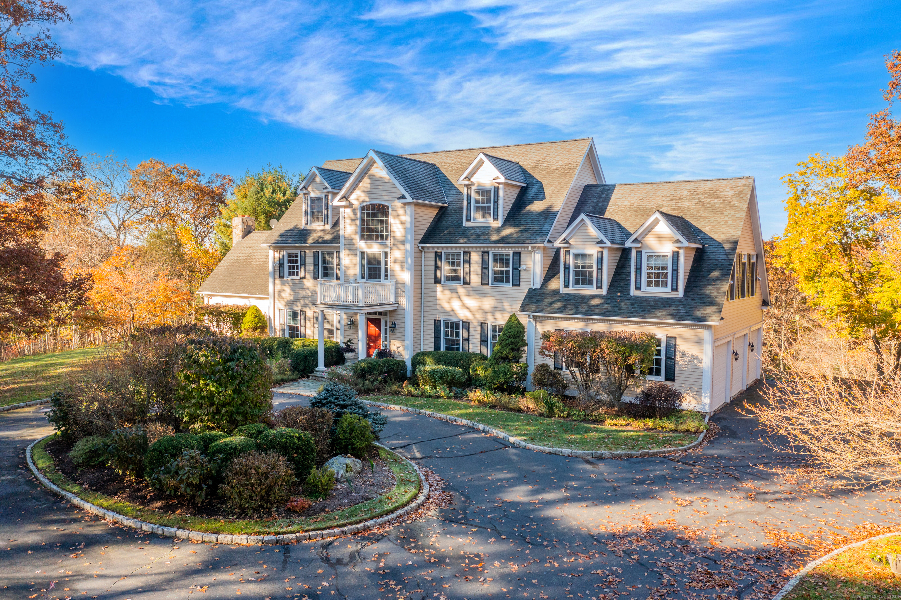 Welcome to this beautiful updated custom-built center hall colonial on 6 acres...