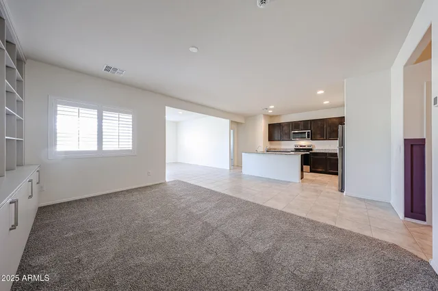 a view of an empty walk in closet