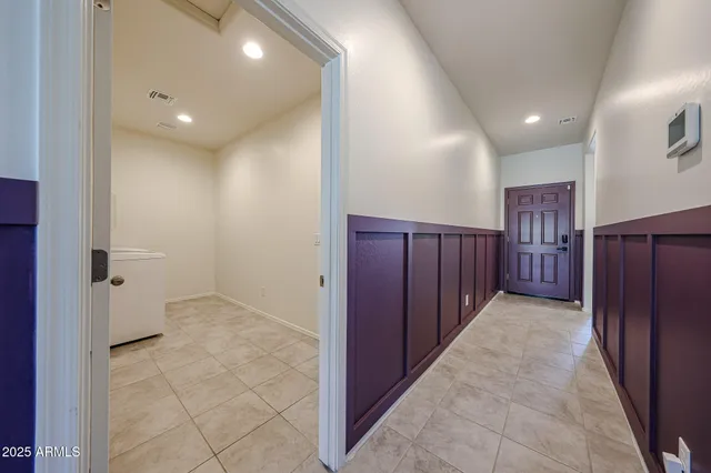 a view of hallway with washer and dryer