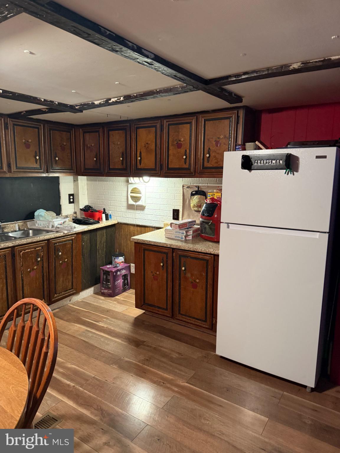 18 Caravan Court Middletown, PA 17057 - Photo 5 of 6 Cozy kitchen with classic wooden cabinetry.