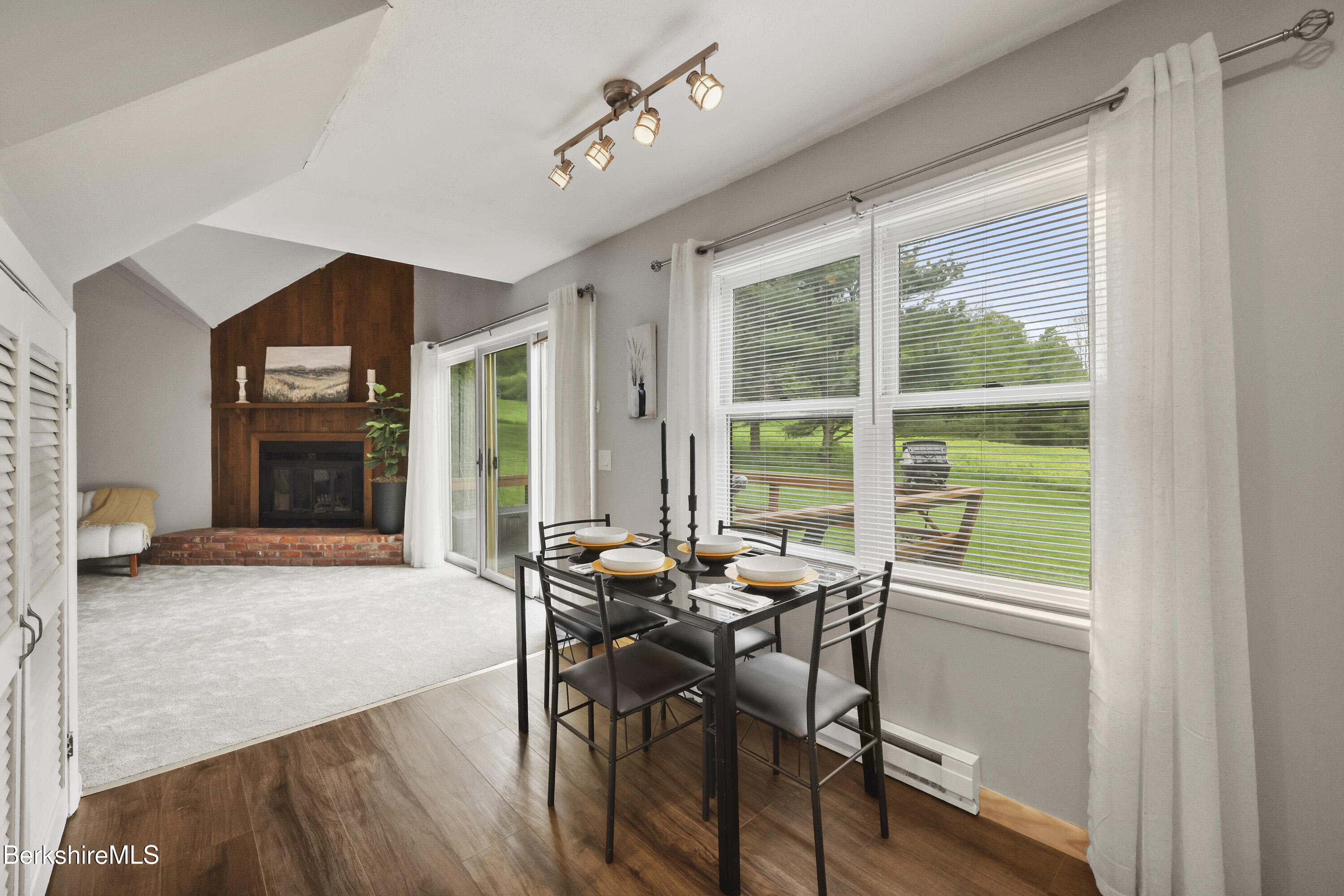 94 Corey Road, Unit D Hancock, MA 01237 - Photo 11 of 45 a view of a dining room with furniture window and outside view