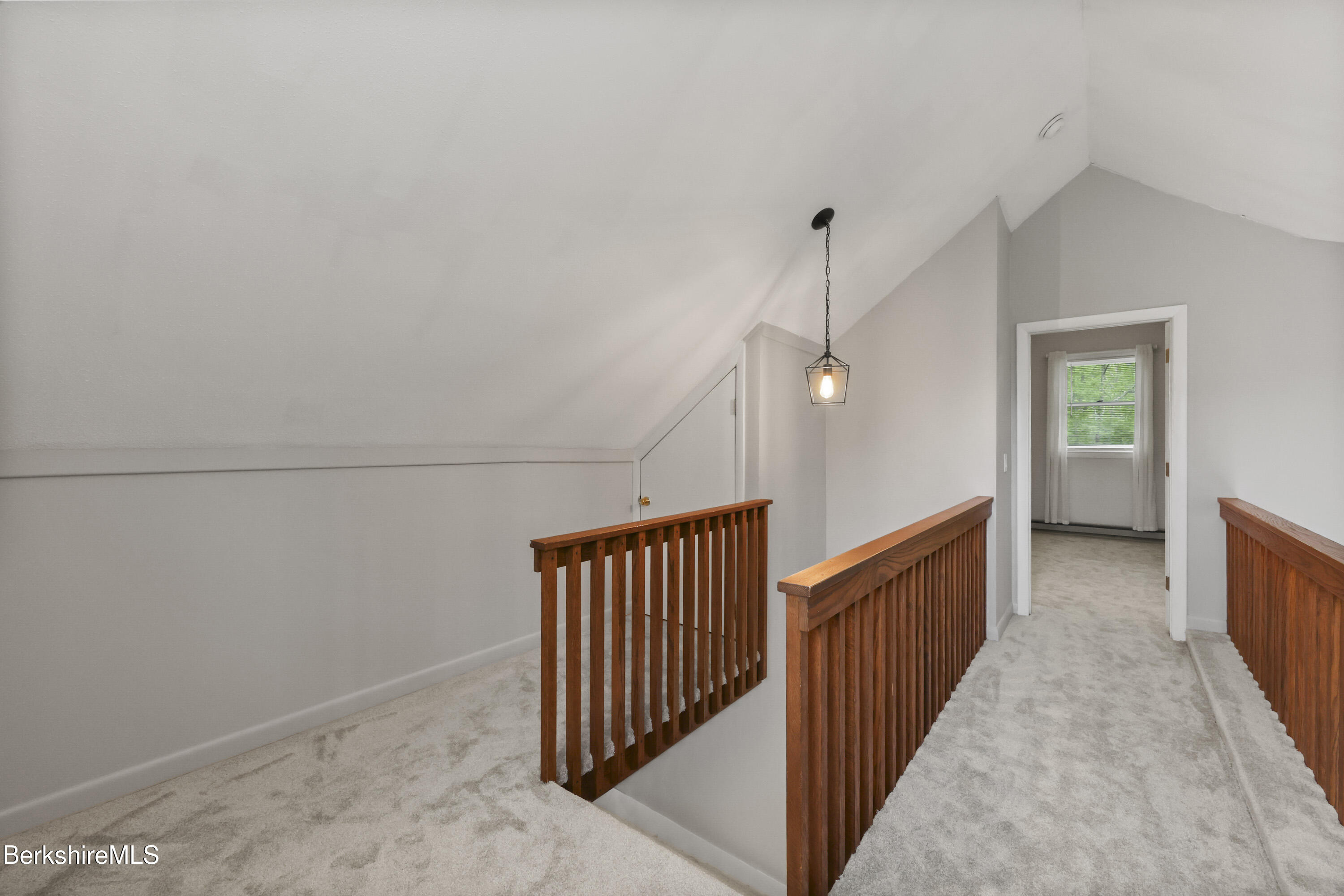 94 Corey Road, Unit D Hancock, MA 01237 - Photo 17 of 45 a view of a hallway with stairs