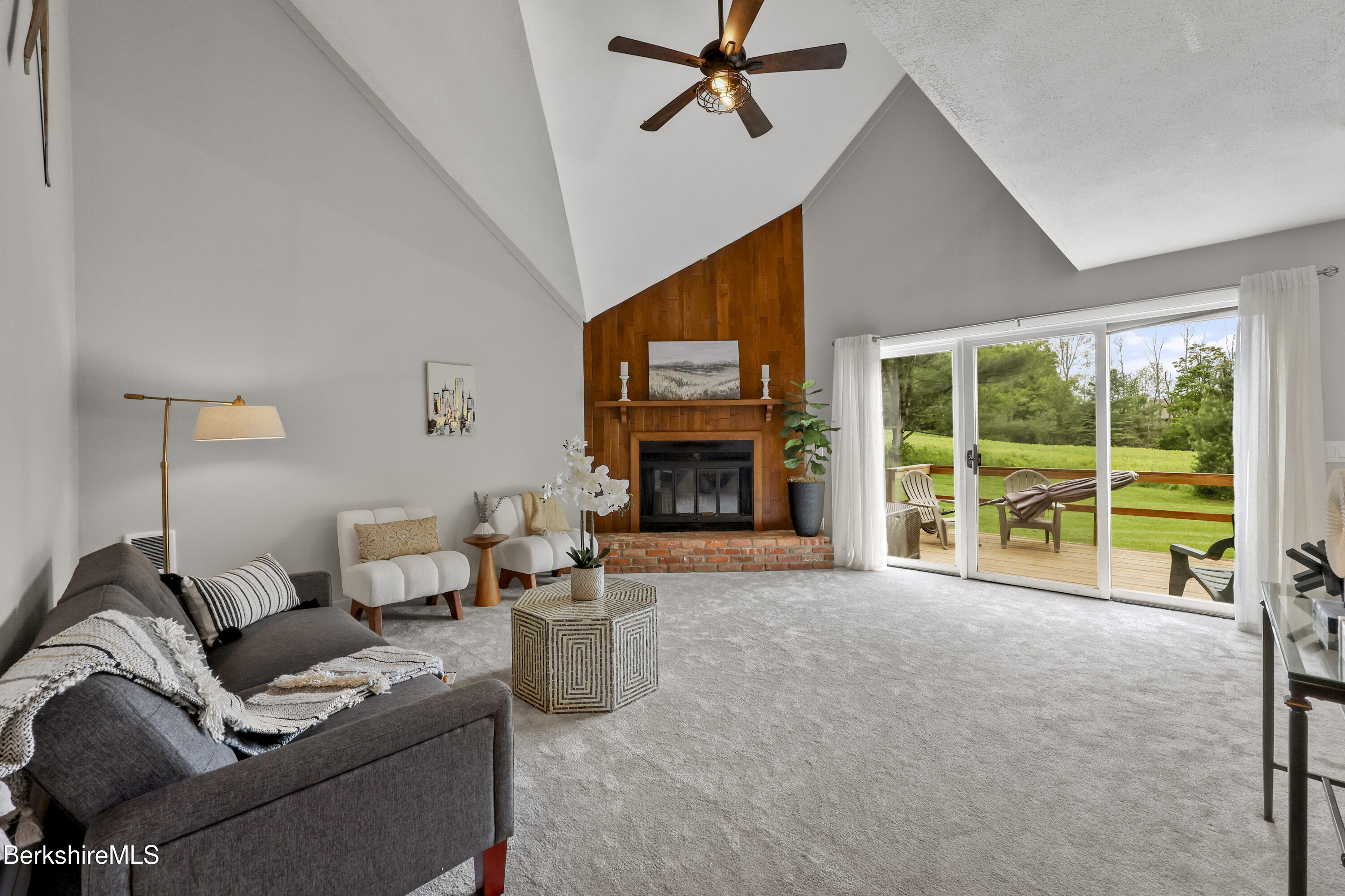94 Corey Road, Unit D Hancock, MA 01237 - Photo 3 of 45 a living room with furniture and a fireplace