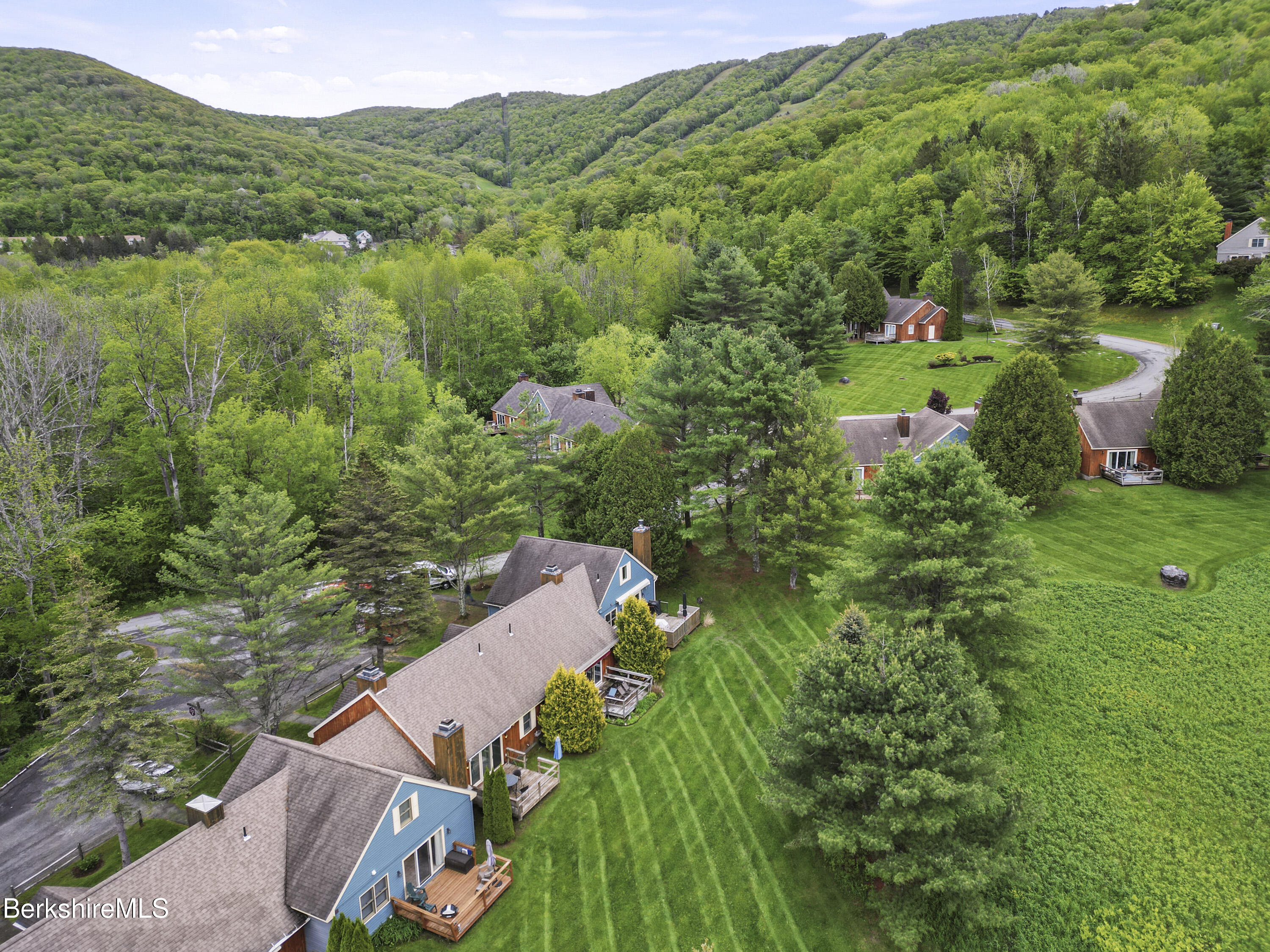 94 Corey Road, Unit D Hancock, MA 01237 - Photo 31 of 45 an aerial view of a house with a yard