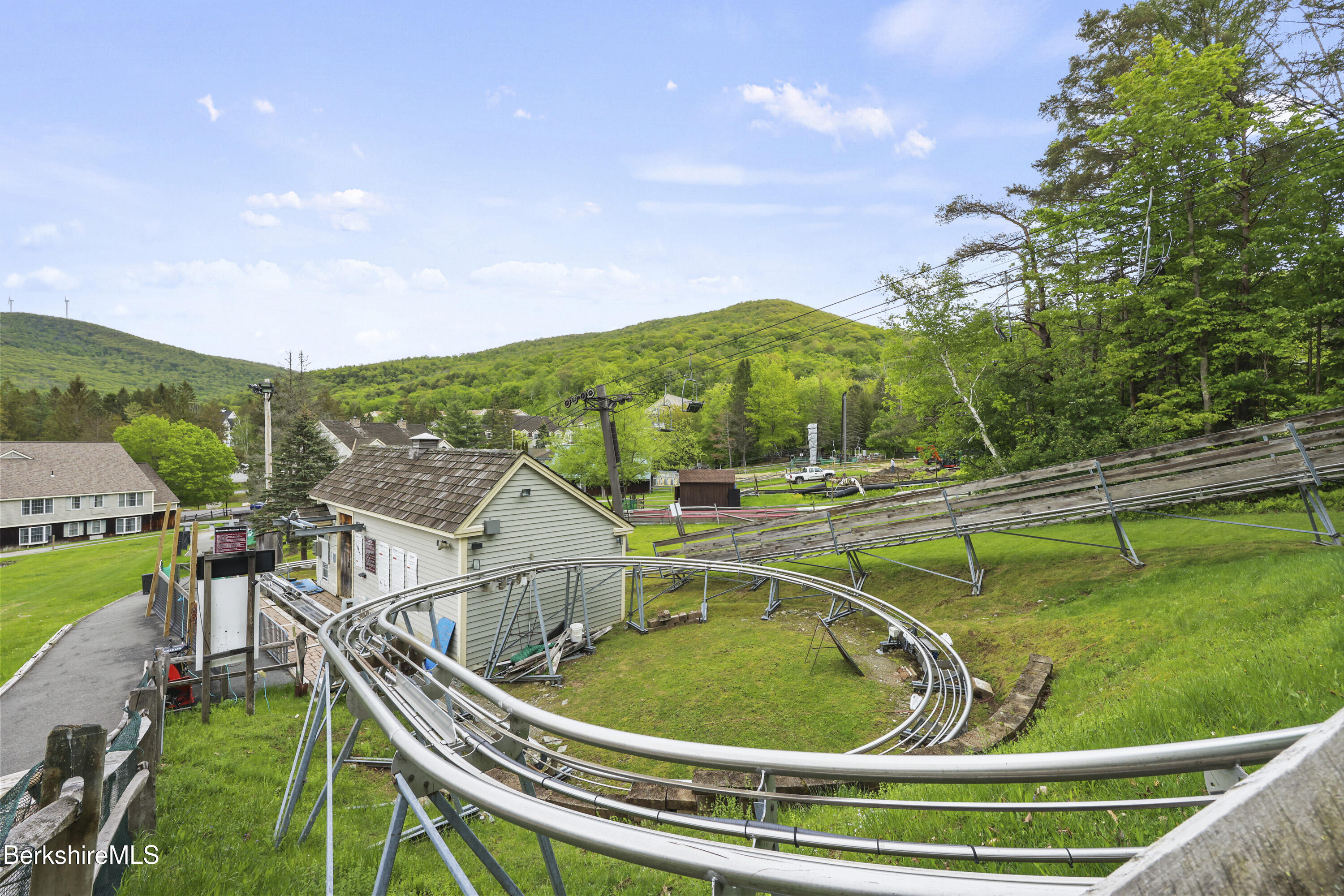 94 Corey Road, Unit D Hancock, MA 01237 - Photo 35 of 45 a view of a swimming pool with a yard