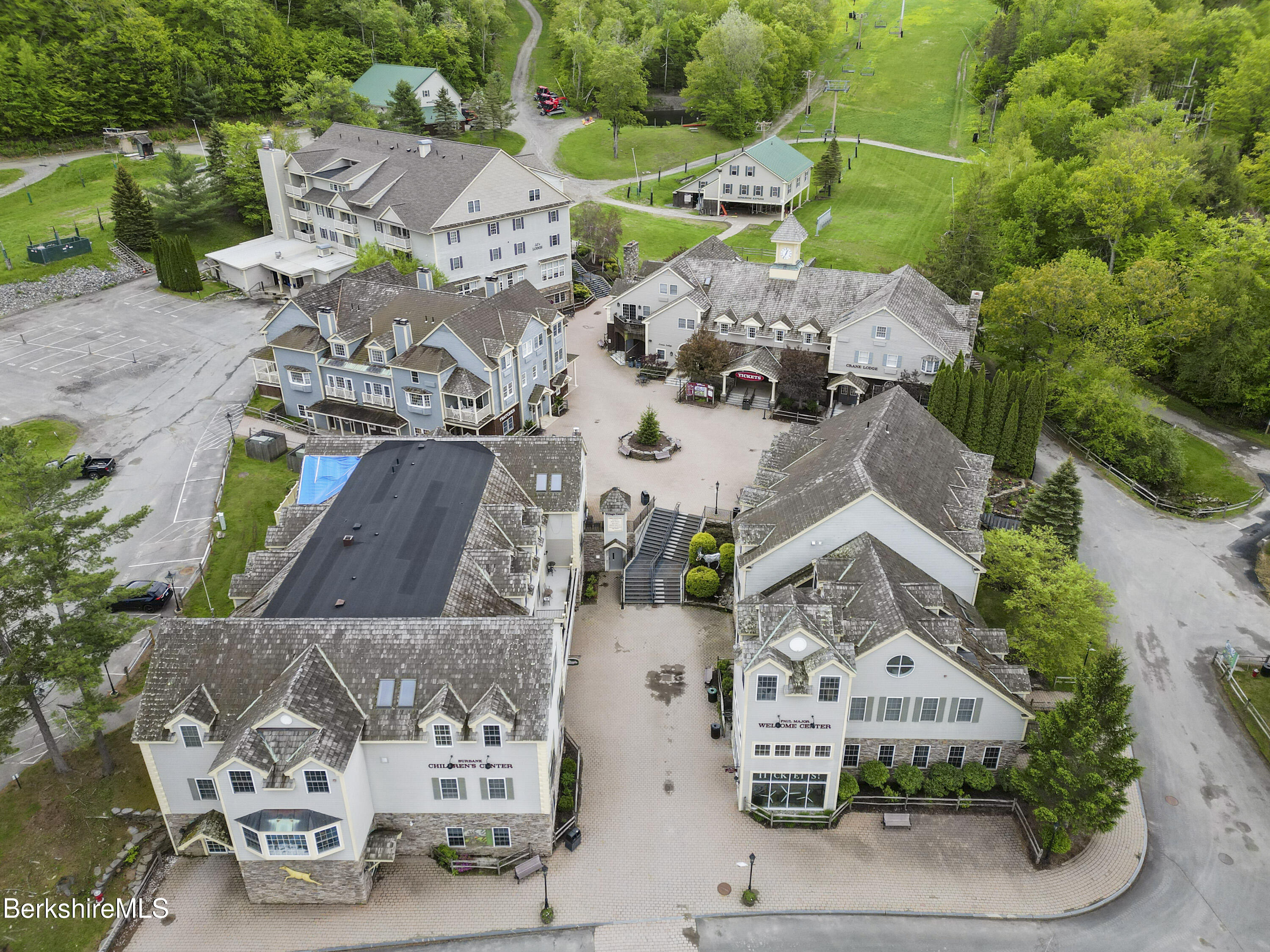 94 Corey Road, Unit D Hancock, MA 01237 - Photo 38 of 45 an aerial view of multiple houses with yard