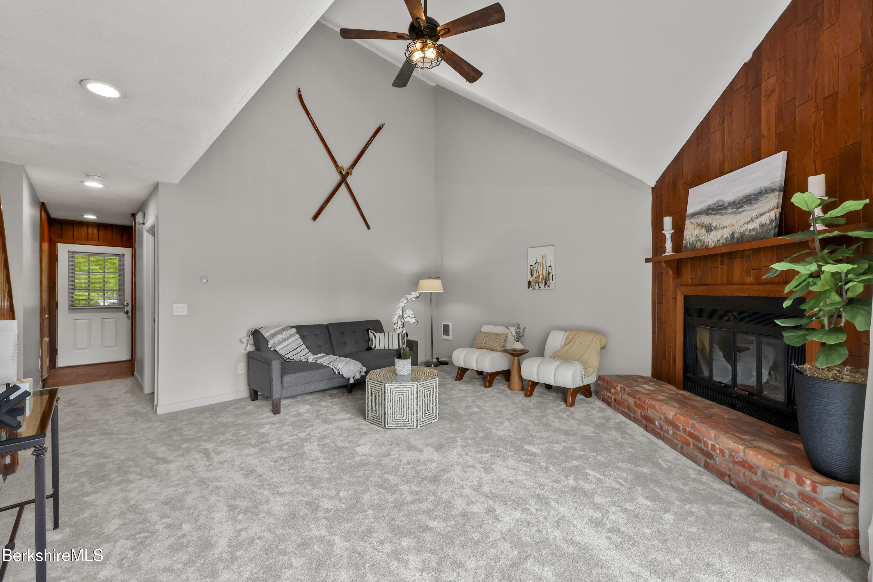 94 Corey Road, Unit D Hancock, MA 01237 - Photo 5 of 45 a living room with furniture and a fireplace