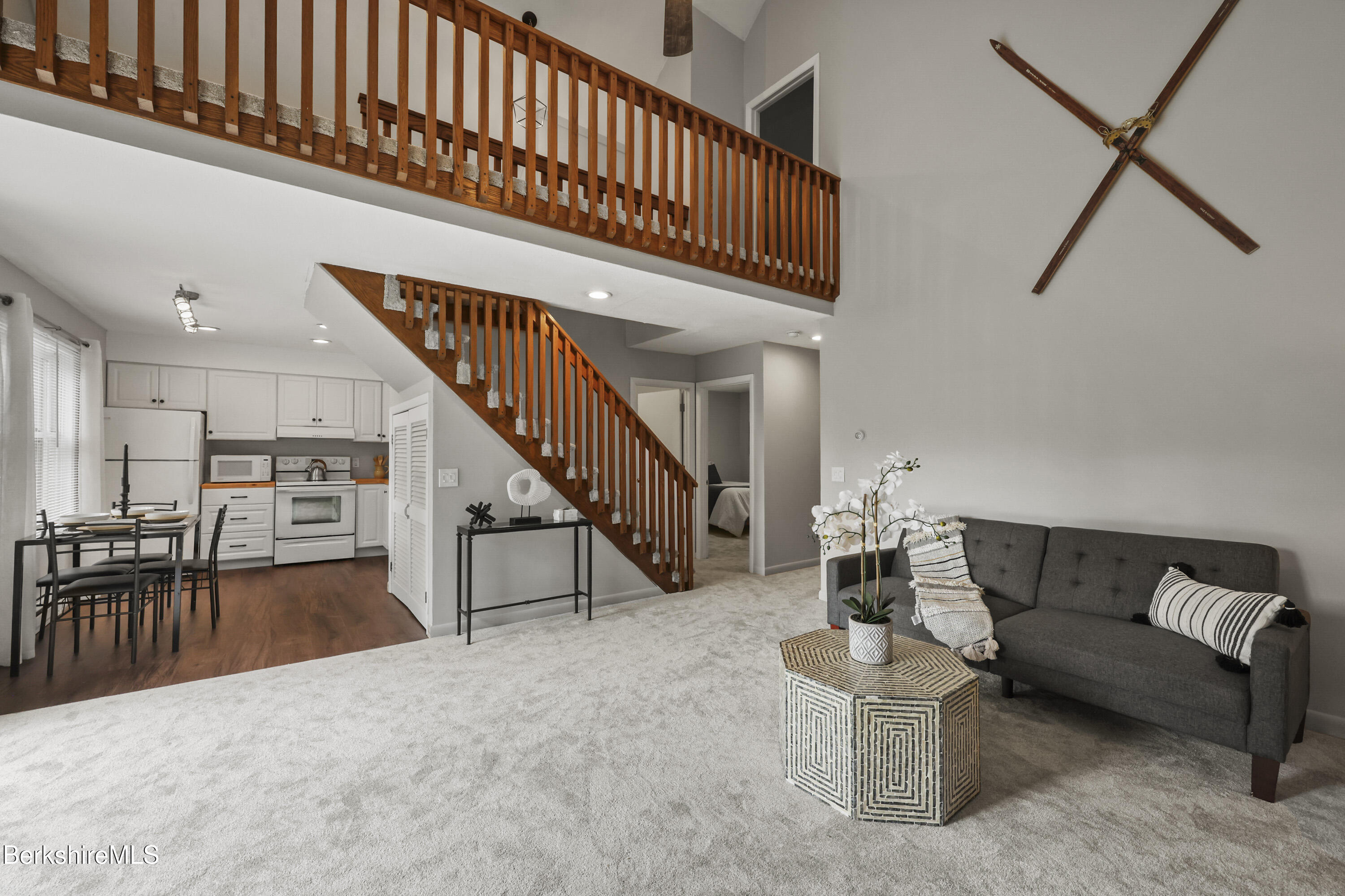 94 Corey Road, Unit D Hancock, MA 01237 - Photo 6 of 45 a living room with furniture and a dining table