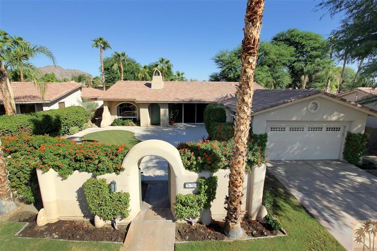 78780 Rio Seco La Quinta, CA 92253 - Photo 1 of 37 a front view of a house with a garden