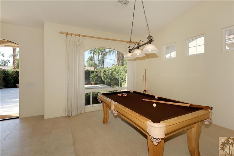 78780 Rio Seco La Quinta, CA 92253 - Photo 21 of 37 a room with chandelier and a table