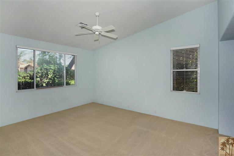 78780 Rio Seco La Quinta, CA 92253 - Photo 24 of 37 an empty room with windows