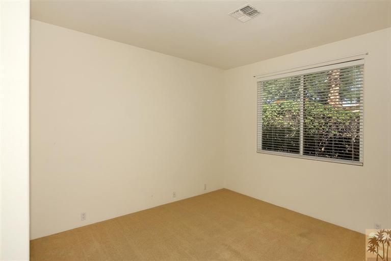 78780 Rio Seco La Quinta, CA 92253 - Photo 31 of 37 a view of an empty room with a window