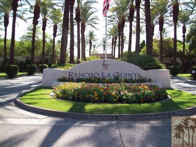 78780 Rio Seco La Quinta, CA 92253 - Photo 36 of 37 a view of a garden with plants and large trees