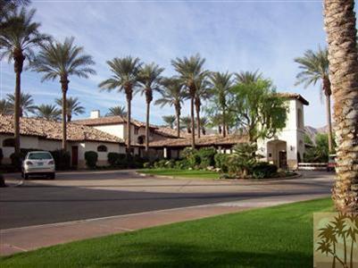 78780 Rio Seco La Quinta, CA 92253 - Photo 37 of 37 a front view of multiple houses with yard