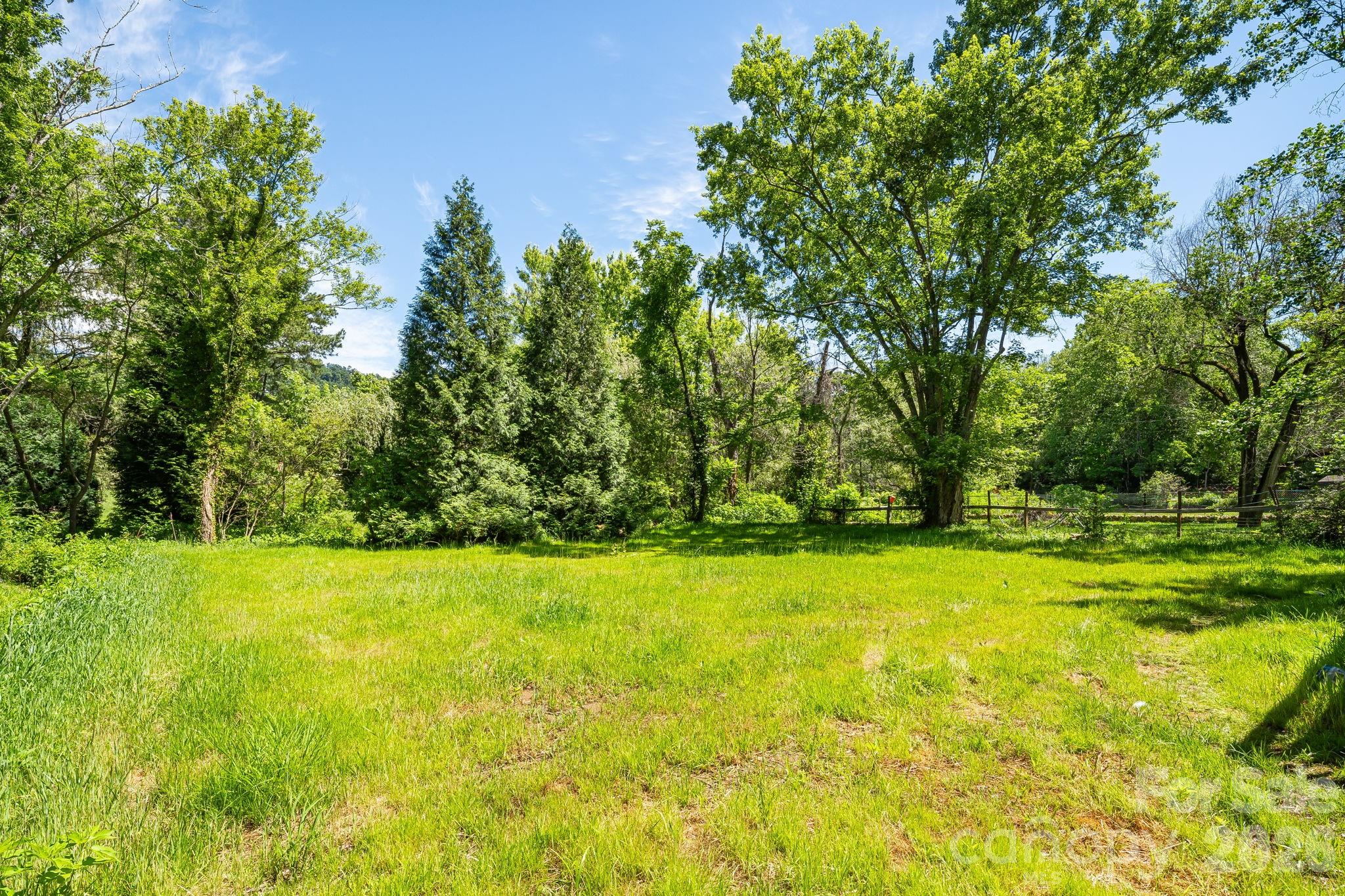 468 Beaverdam Road Asheville, NC 28804 - Photo 3 of 19 a view of swimming pool and mountain view