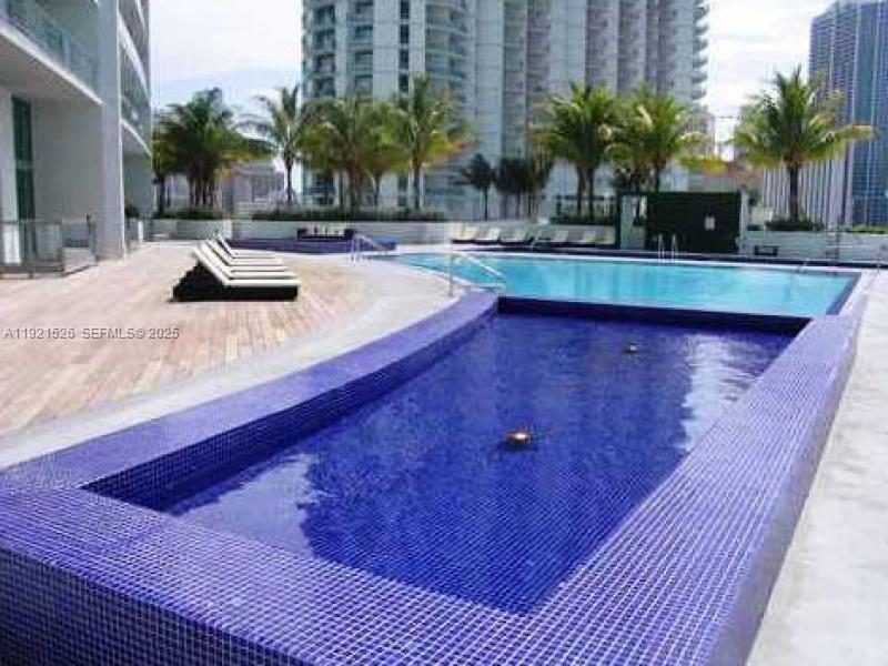 90 Southwest 3rd Street, Unit 4105 Miami, FL 33130 - Photo 27 of 27 a view of outdoor space with swimming pool and patio