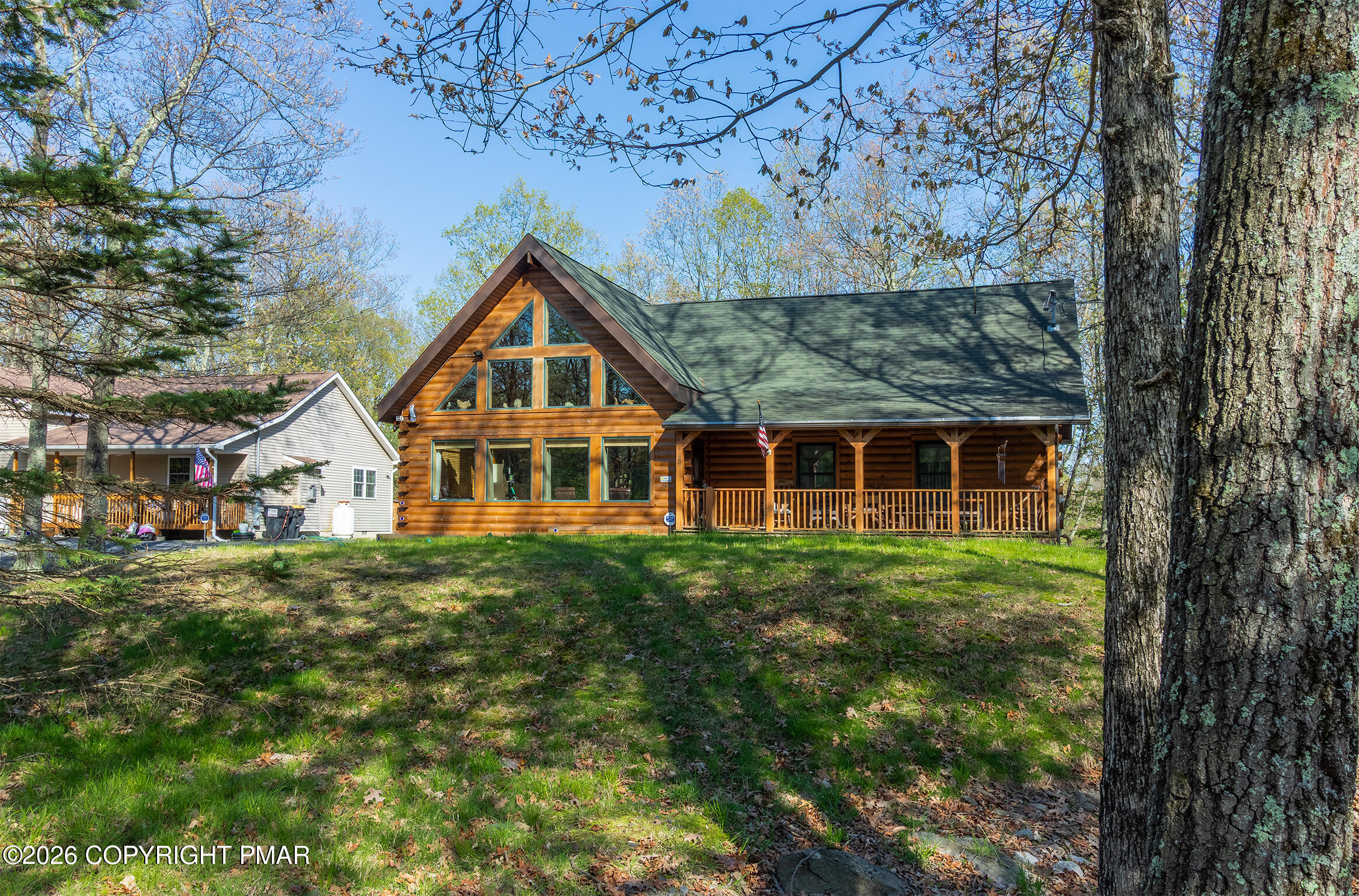 1160 Bluebird Lane Bushkill, PA 18324 - Photo 43 of 44 a front view of a house with a yard