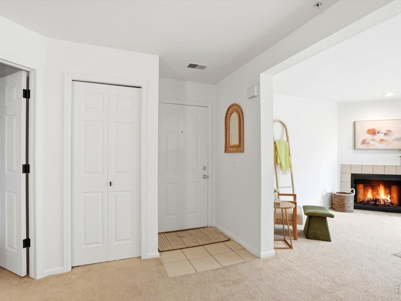 4945 Twin Lakes Road, Unit 46 Boulder, CO 80301 - Photo 6 of 42 A welcoming foyer opens into an inviting living space designed for comfortable everyday living.