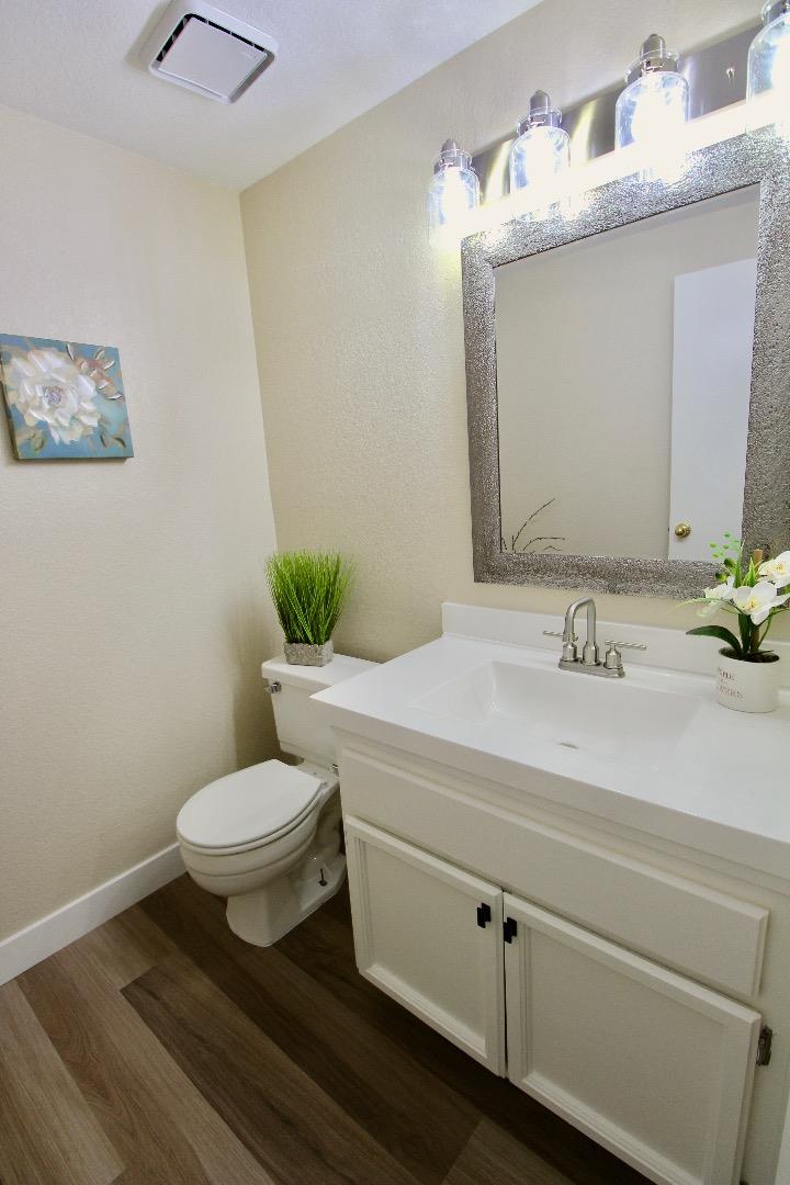 60 Cherryton Lane San Jose, CA 95136 - Photo 13 of 31 a bathroom with a toilet sink and mirror