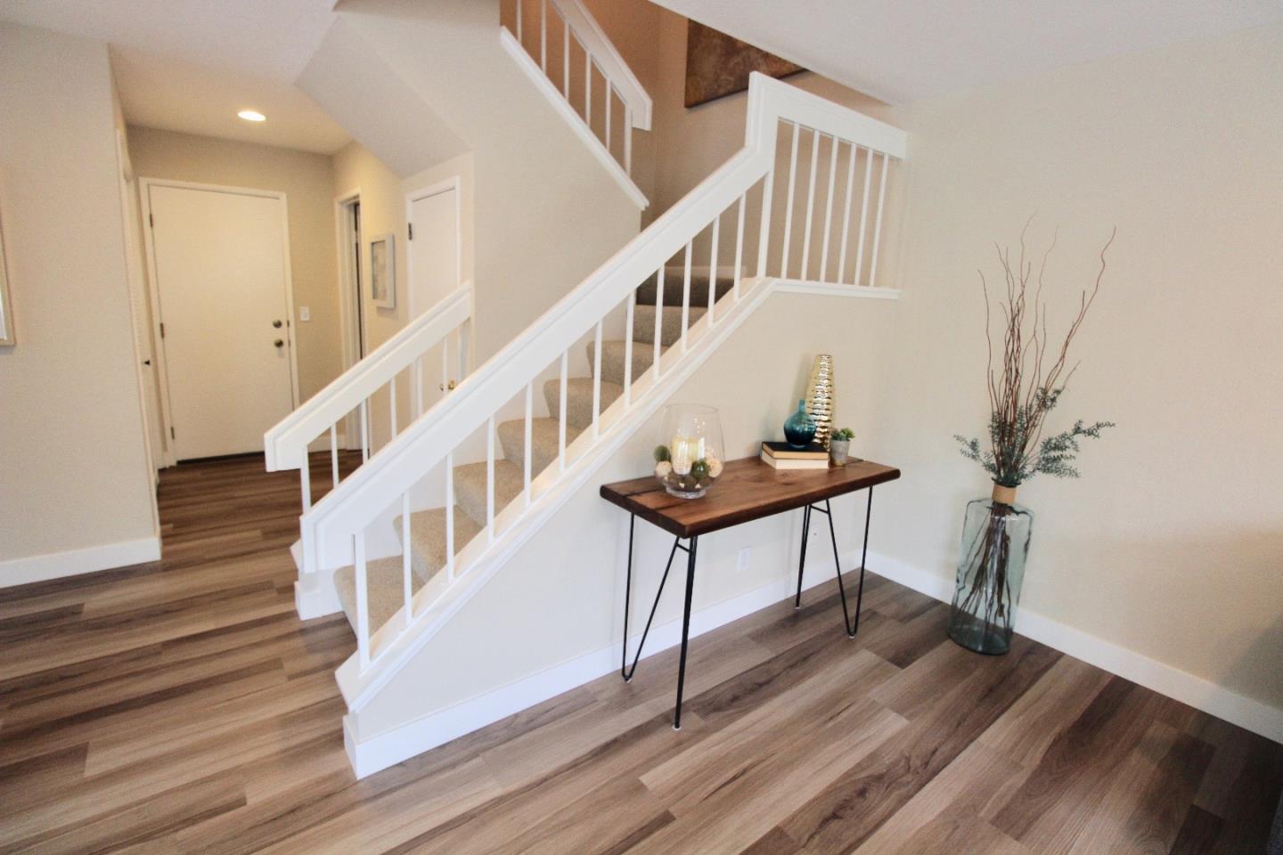 60 Cherryton Lane San Jose, CA 95136 - Photo 15 of 31 a view of entryway and hall with wooden floor