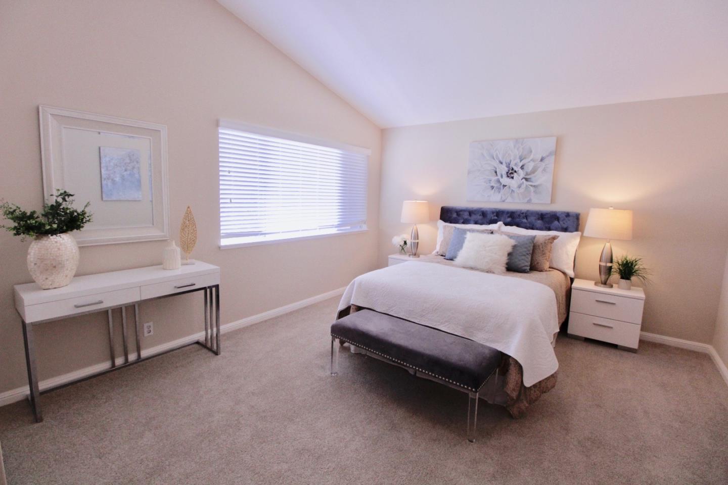 60 Cherryton Lane San Jose, CA 95136 - Photo 17 of 31 a bedroom with a bed and window