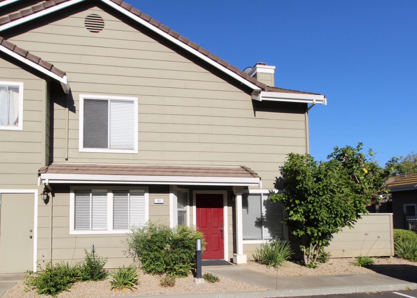 60 Cherryton Lane San Jose, CA 95136 - Photo 2 of 31 a front view of a house with a garage