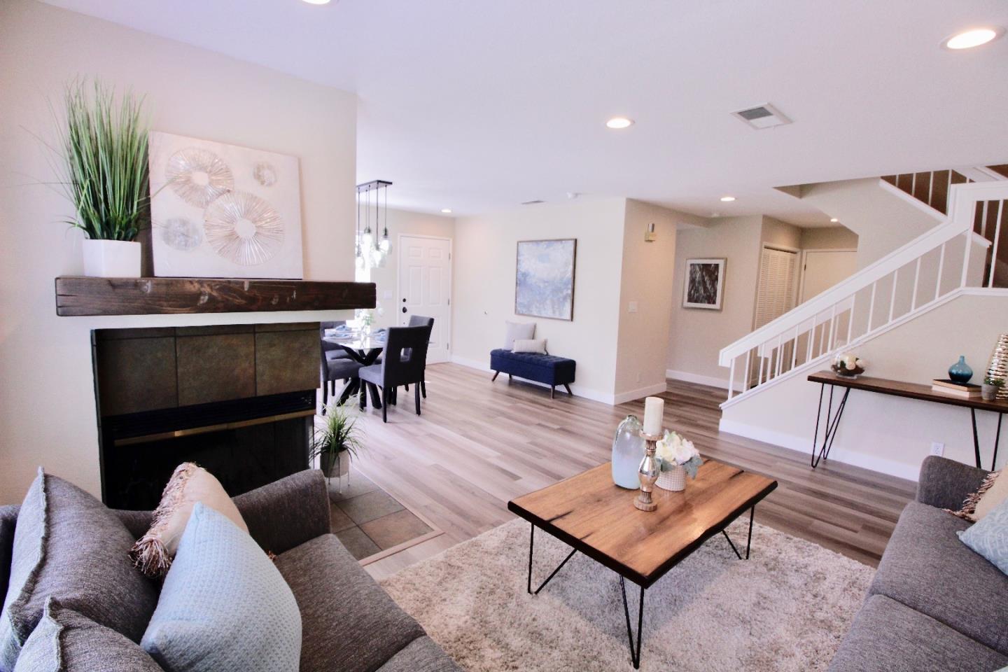 60 Cherryton Lane San Jose, CA 95136 - Photo 3 of 31 a living room with furniture a table and a potted plant
