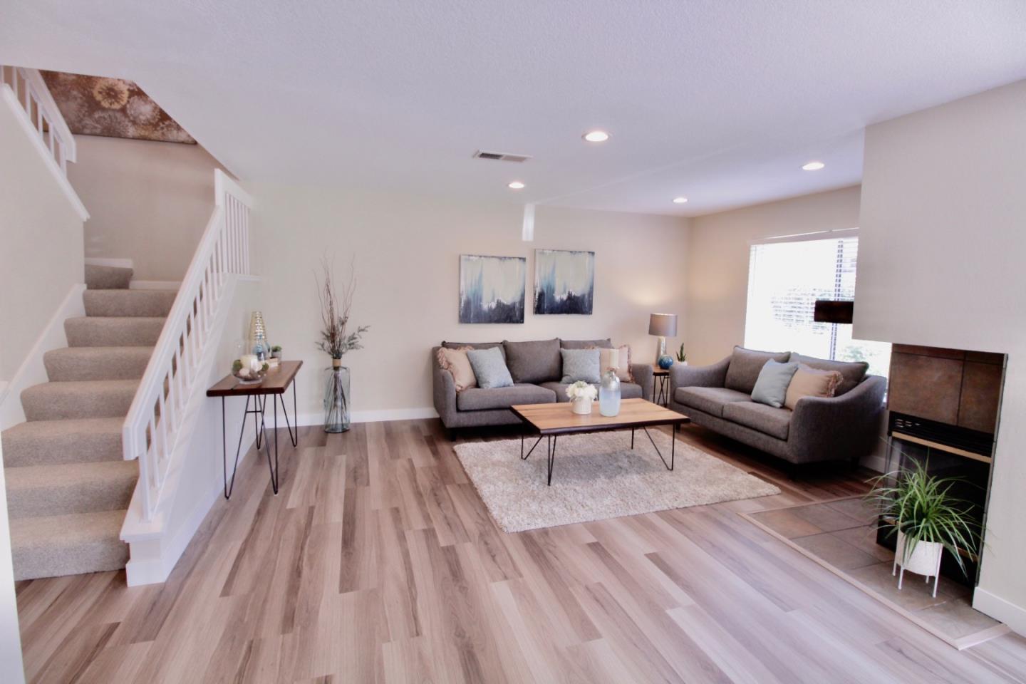 60 Cherryton Lane San Jose, CA 95136 - Photo 4 of 31 a living room with furniture and a wooden floor