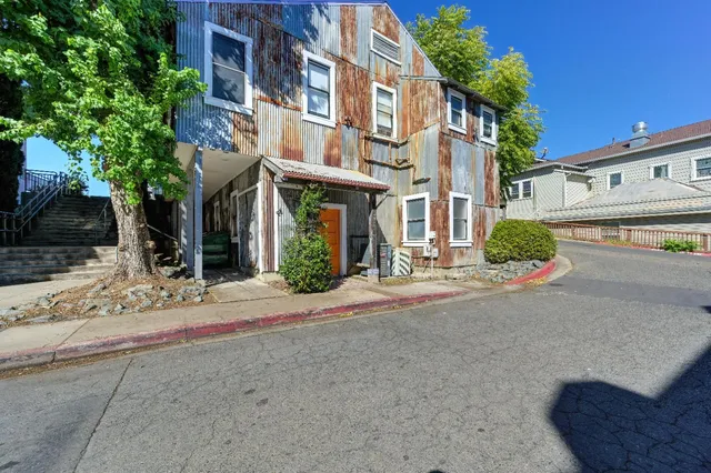 a front view of a building with street view