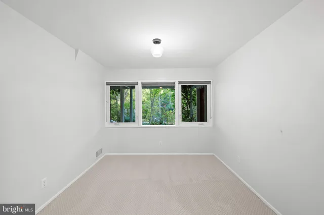 an empty room with a window