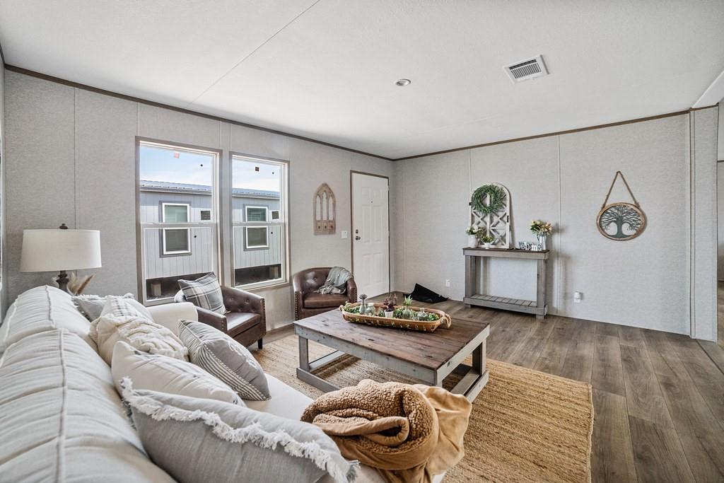 164 Ranya Loop Decatur, TX 76234 - Photo 4 of 31 a living room with furniture and a table