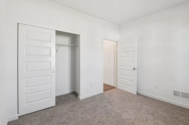 an empty room with closet