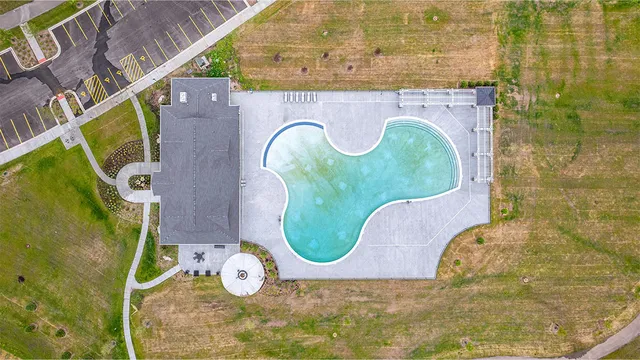 an aerial view of a swimming pool