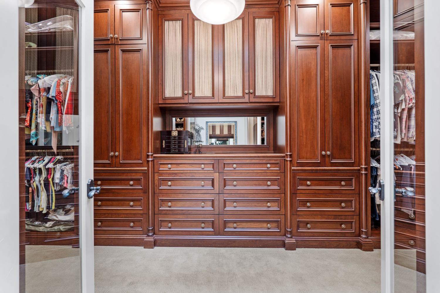 10676 Wilton Road Elk Grove, CA 95624 - Photo 40 of 71 a view of walk in closet with clothes
