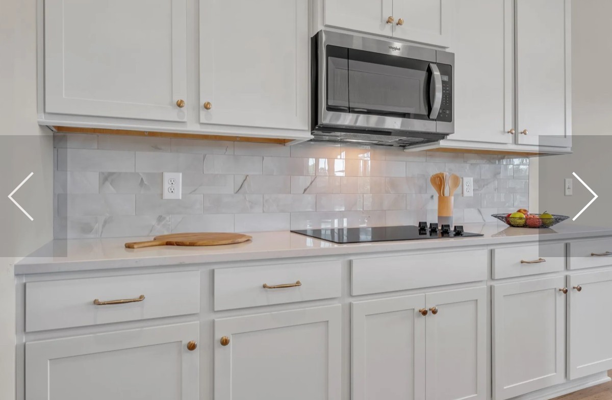 6509 Ripple Ridge Columbia, TN 38401 - Photo 13 of 20 a kitchen with white cabinets and appliances