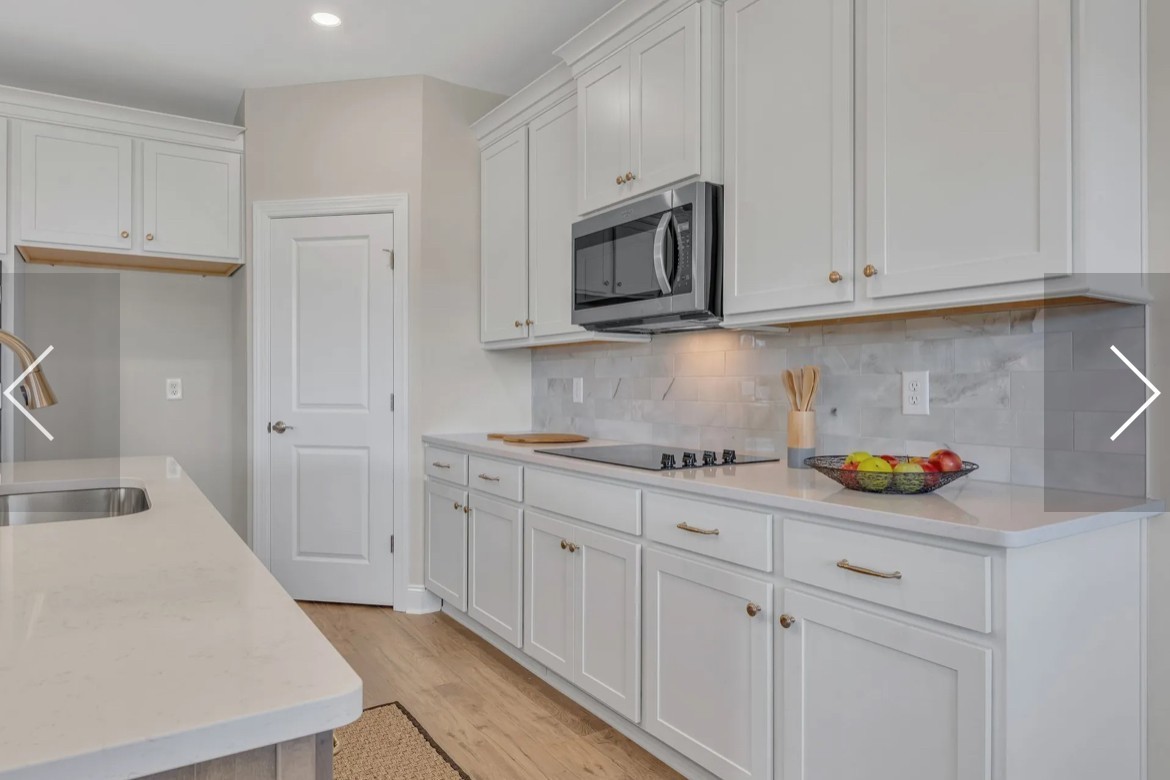 6509 Ripple Ridge Columbia, TN 38401 - Photo 15 of 20 a kitchen with white cabinets and sink