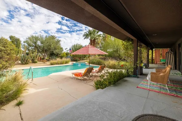 a view of a yard with an outdoor space