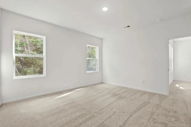 an empty room with windows