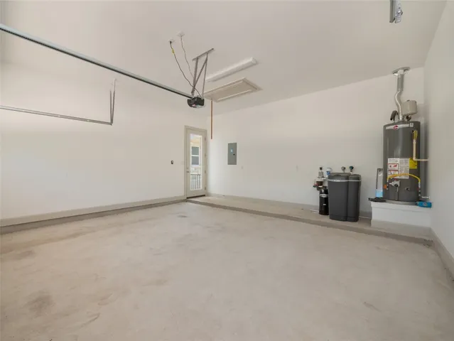 a view of a big room with closet and windows