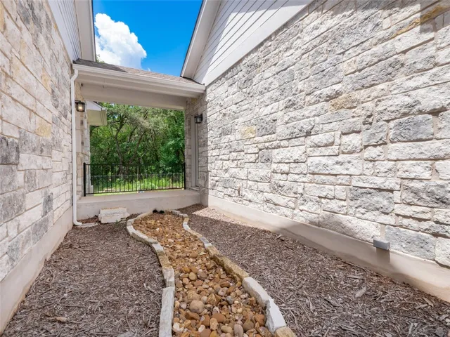 a view of a backyard of the house