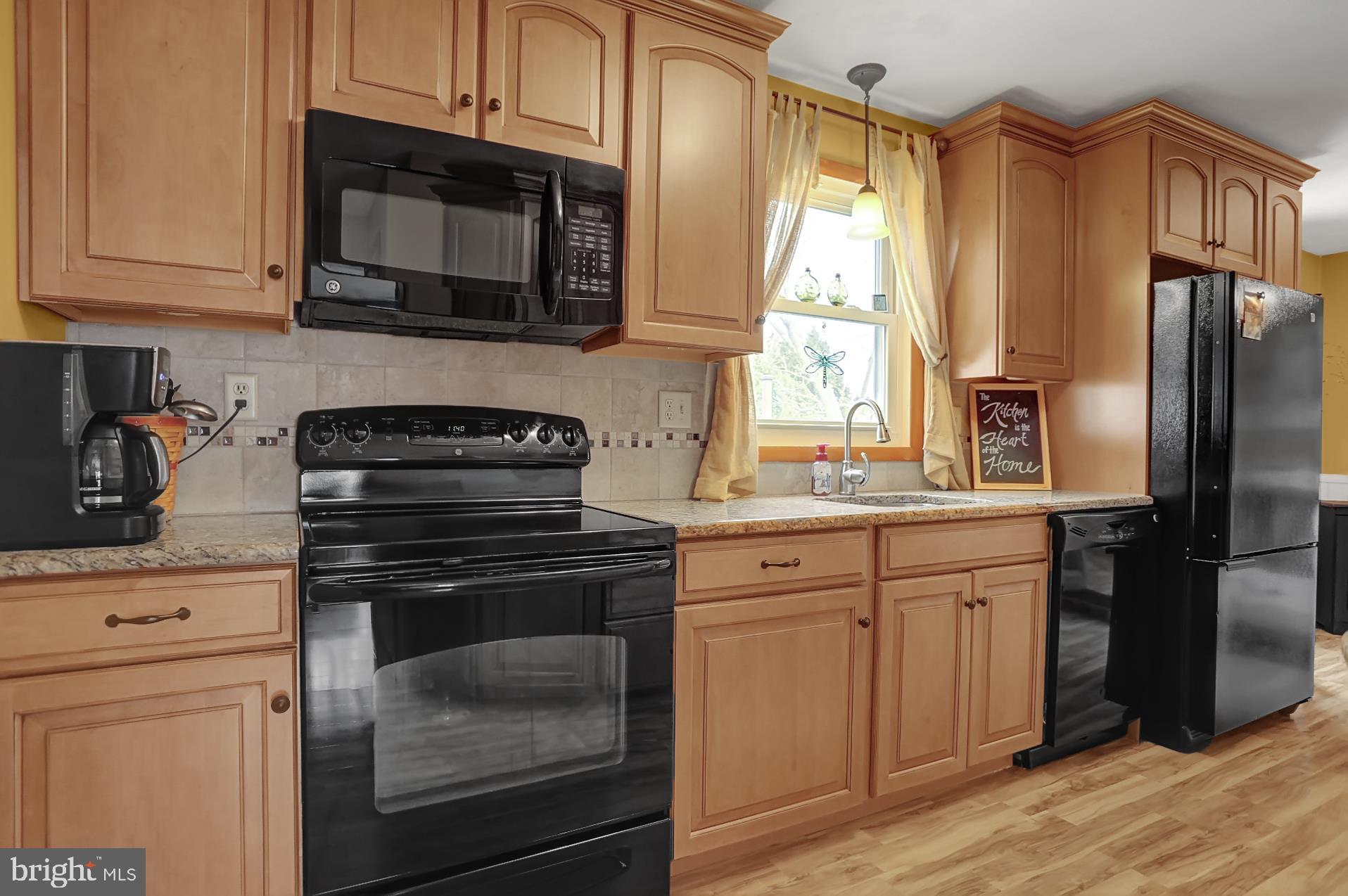 253 South View Road Fleetwood, PA 19522 - Photo 11 of 35 An updated kitchen with maple cabinets.
