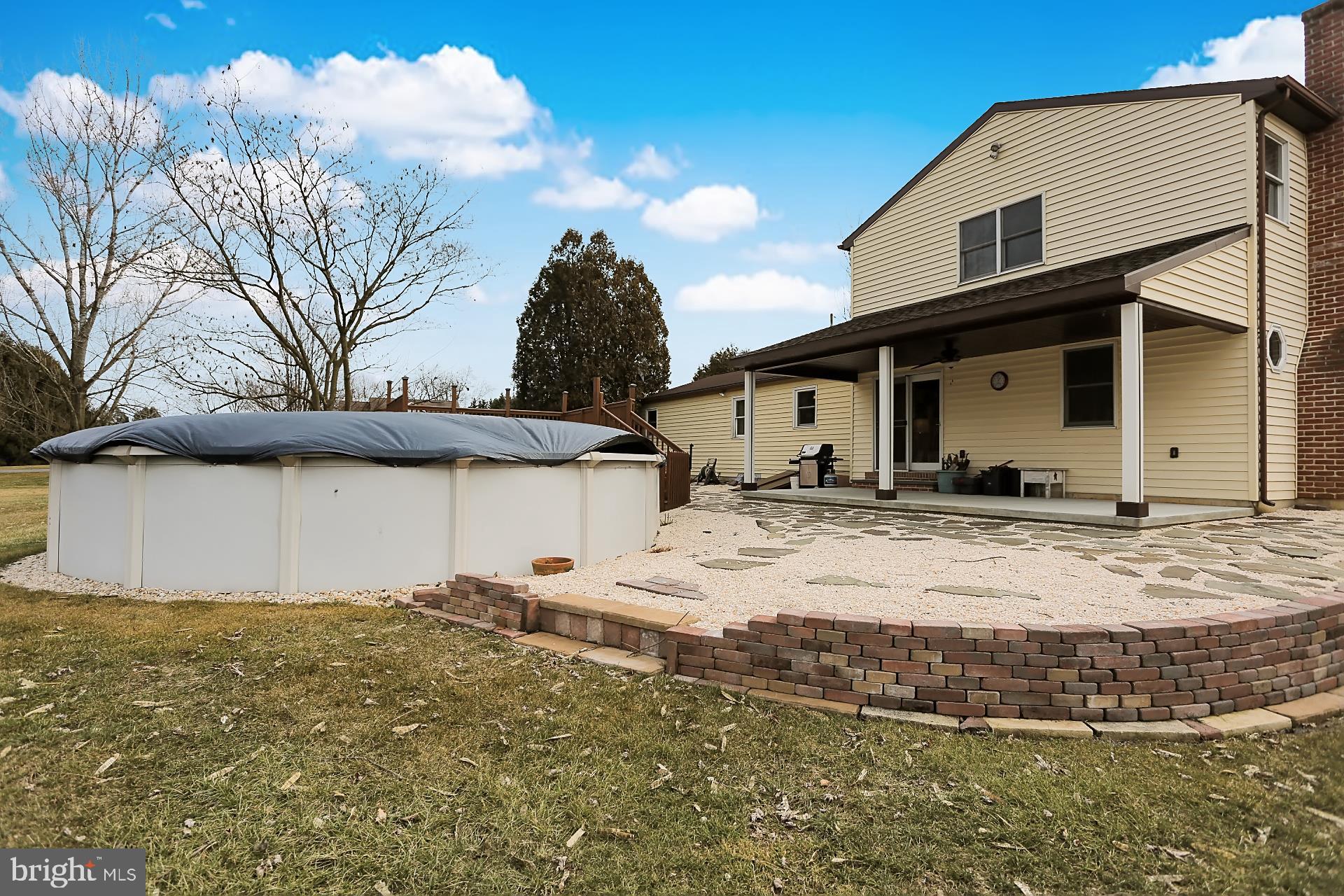 253 South View Road Fleetwood, PA 19522 - Photo 26 of 35 Covered patio and above ground pool.