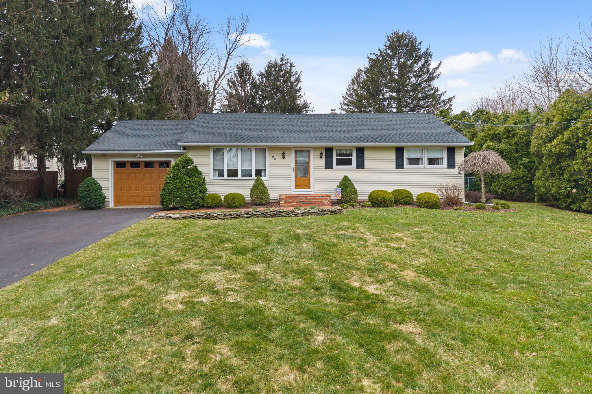 front view of a house with yard