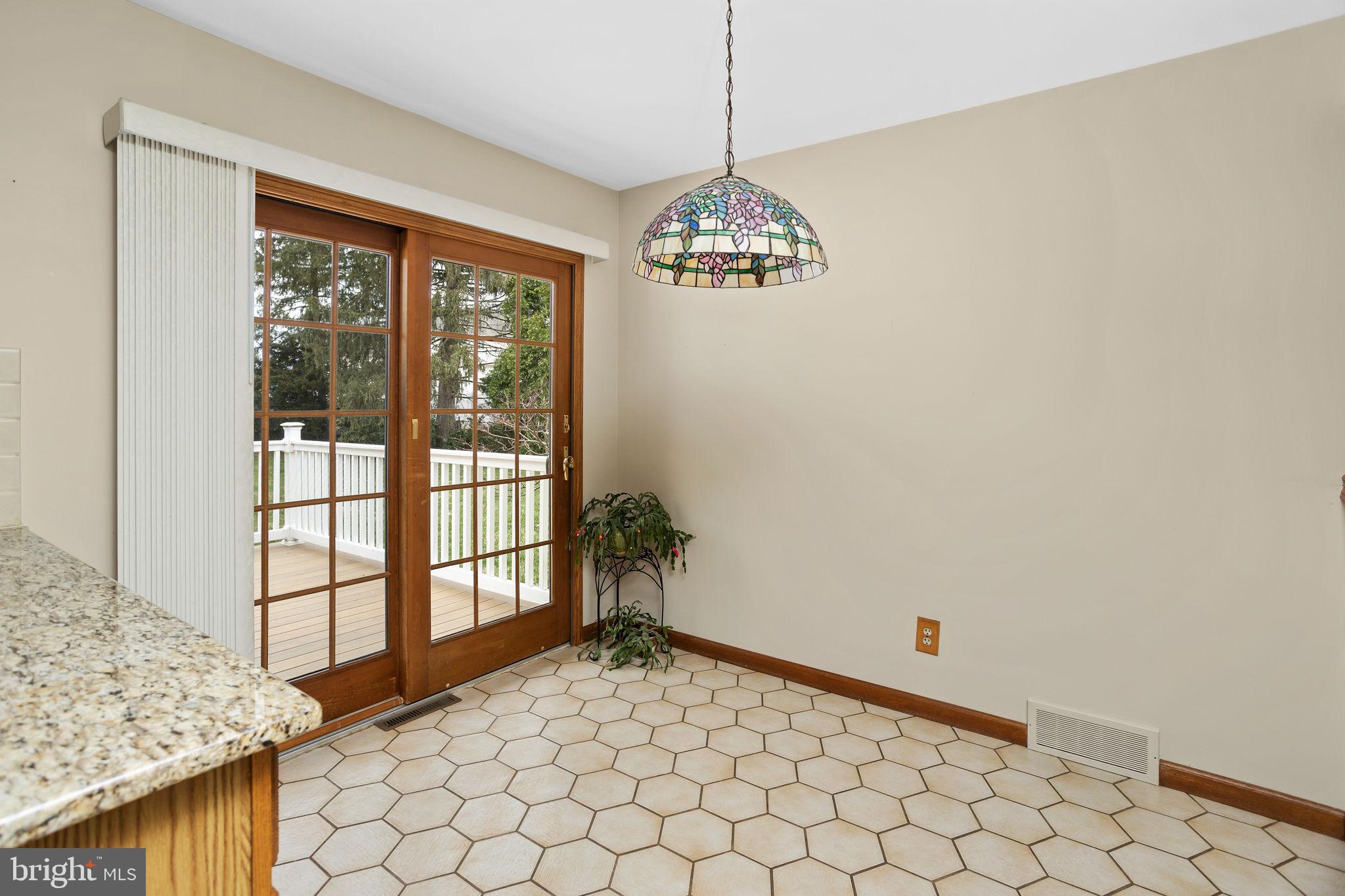 96 Bordentown Chesterfield Road Chesterfield, NJ 08515 - Photo 11 of 42 a view of a livingroom with a chandelier fan and windows
