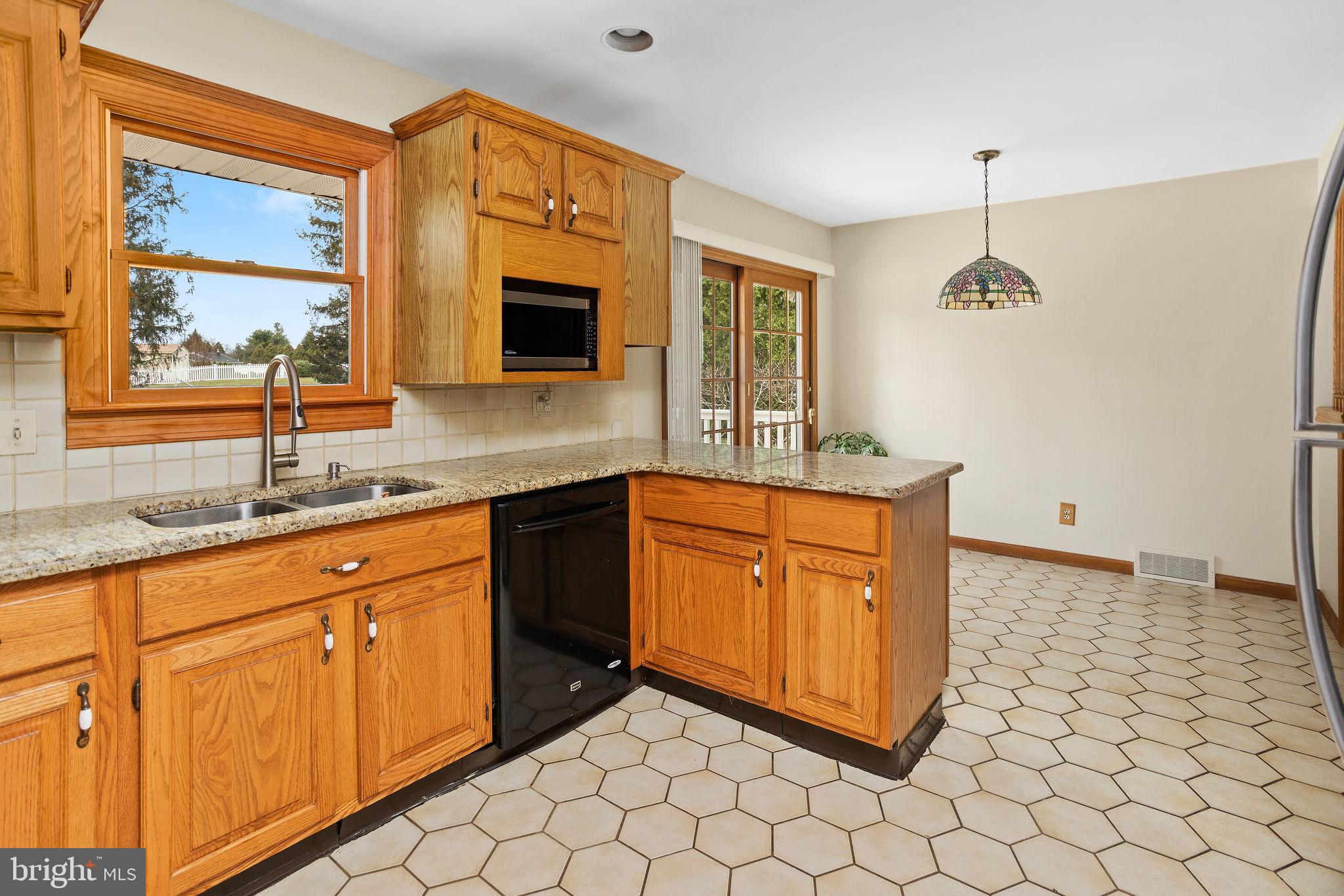 96 Bordentown Chesterfield Road Chesterfield, NJ 08515 - Photo 14 of 42 a kitchen with stainless steel appliances granite countertop a sink and a granite counter tops